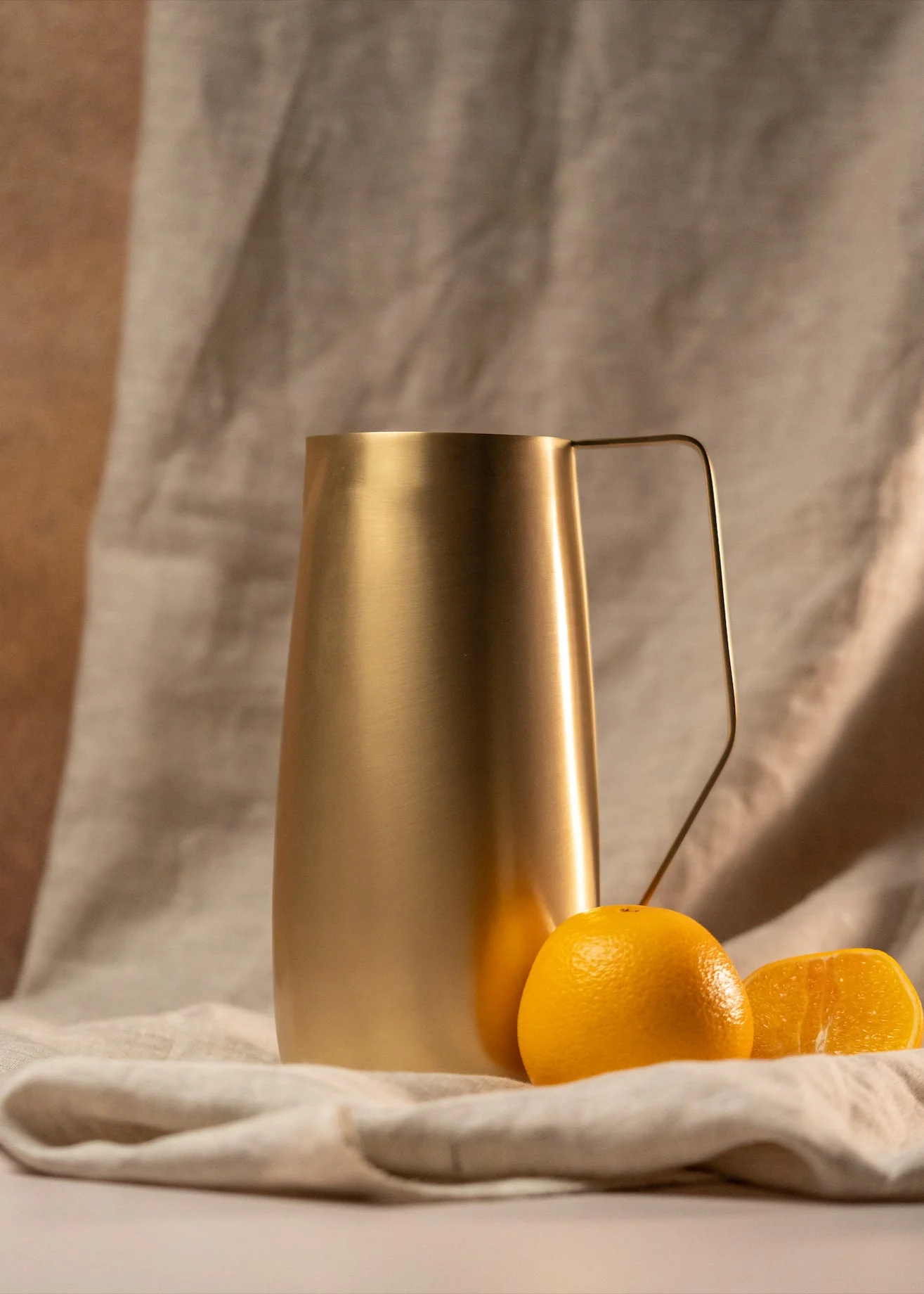 Powered by People Artisan Brass Pitcher - Image 3